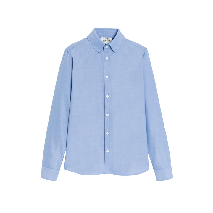 Long sleeve Oxford uniform shirt for boys in blue by FRANÇOIS, featuring a classic collar and button-up front.