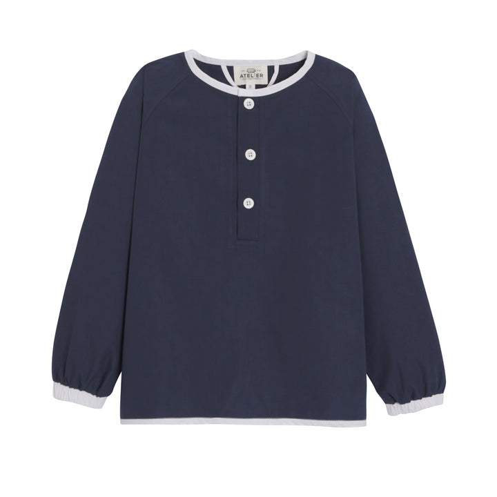 Mixte school apron in marine blue by JOSEPH, featuring a classic design suitable for children.