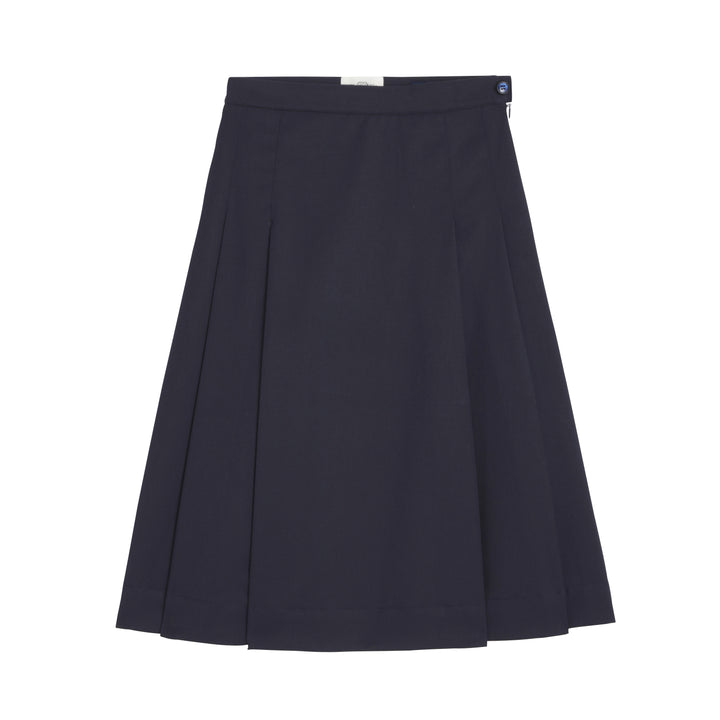 Jupe Écoles de Fanjeaux fille en bleu marine, design élégant de la marque JULIE, vue de face avec plis délicats.