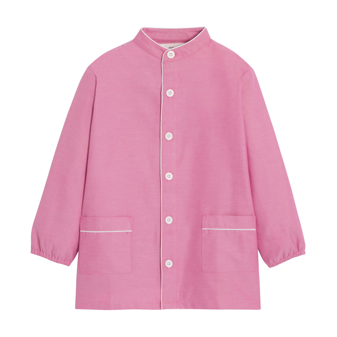 Mixte school apron in rose color by PAUL, featuring adjustable neck straps and a practical pocket design.