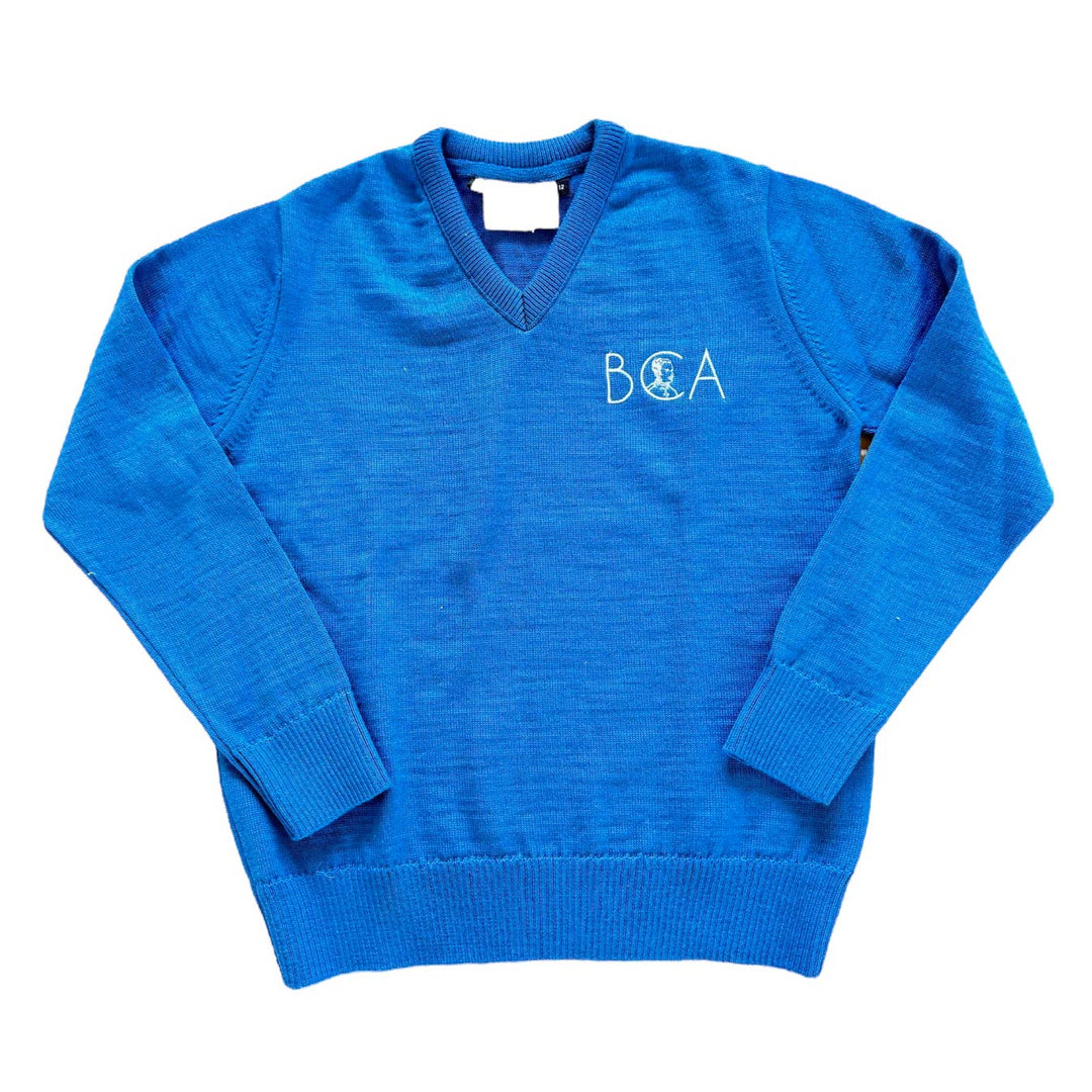 Pull-over gris Atelier des Uniformes François pour homme, porté, détail du col et texture douce visible.